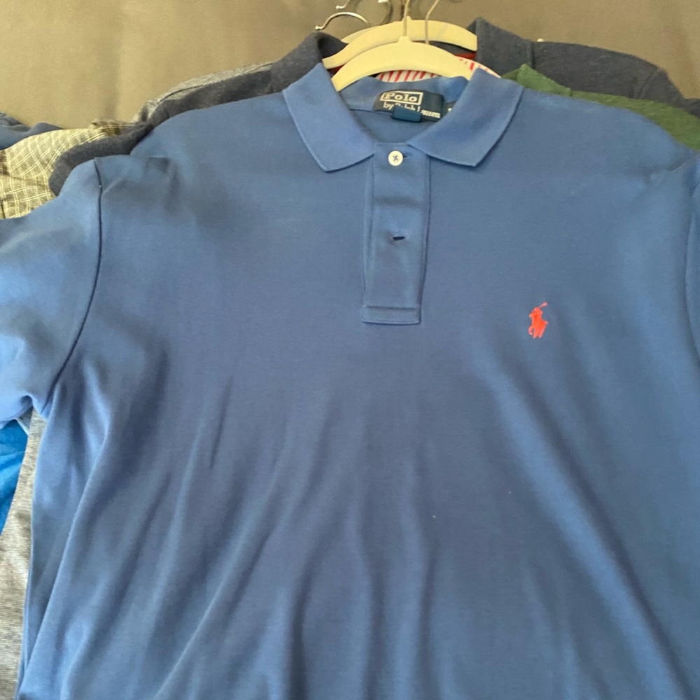 Men’s short sleeve polo style collared shirt.  Excellent condition.